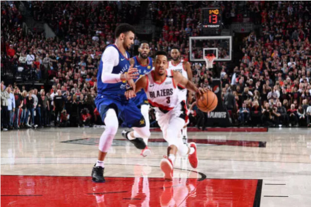  掘金队加时险胜雄鹿登顶西部  